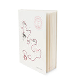 Pack Niji con cuaderno, vela, taza y botella del Hilo Rojo.