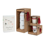 Pack Satori con vela, taza, caja de láminas y botella del Hilo Rojo.